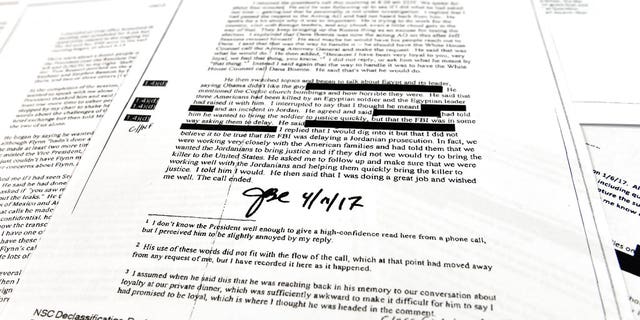 Copies of the memos written by former FBI Director James Comey are photographed in Washington, Thursday, April 19, 2018. President Donald Trump told former FBI Director James Comey that he had serious concerns about the judgment of his first national security adviser, Michael Flynn, according to memos maintained by Comey and obtained by The Associated Press. The 15 pages of documents contain new details about a series of interactions that Comey had with Trump in the weeks before his May 2017 firing. Those encounters include a White House dinner at which Comey says Trump asked him for his loyalty. (AP Photo/Susan Walsh)