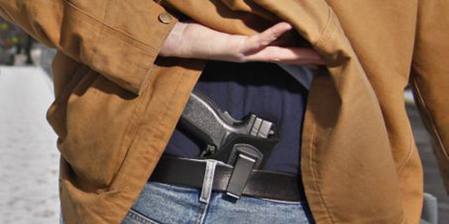 A new study finds that an increase in concealed carry permits has accompanied a decrease in murder. (AP)