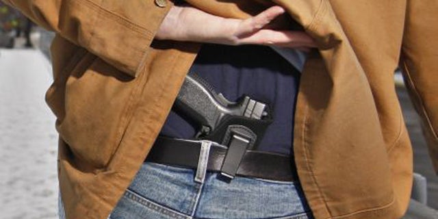 A new study finds that an increase in concealed carry permits has accompanied a decrease in murder. (AP)