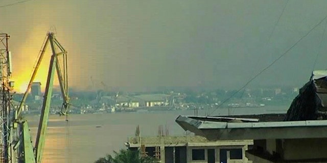 March 4: This video image taken across the Congo river in Kinshasa, Congo shows a blast that rocked Brazzaville the capital of the Republic of Congo.
