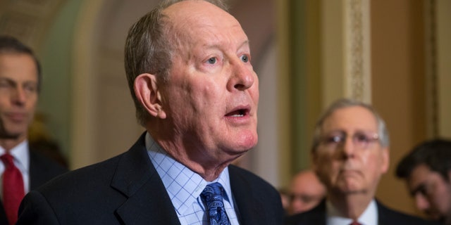Dec. 8, 2015: Sen. Lamar Alexander, R-Tenn., chairman of the Senate Health, Education, Labor, and Pensions Committee, is joined by Senate Majority Leader Mitch McConnell, R-Ky., right, as he speaks to reporters after the Senate voted overwhelmingly to end debate on the makeover of the widely criticized No Child Left Behind Act, setting up a final vote.