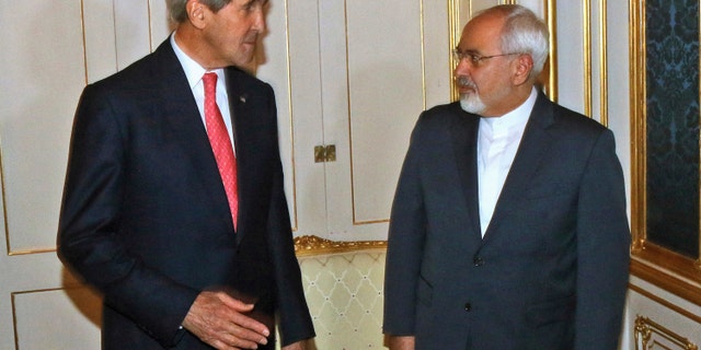 Nov. 23, 2014: Secretary of State John Kerry talks with Iranian Foreign Minister Mohammad Javad Zarif in Vienna, Austria.