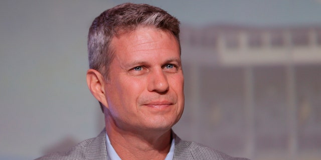 FILE - In this Sept. 19, 2015, file photo, Rep. Bill Huizenga, R-Mich., is seen during a congressional panel at the 2016 Mackinac Republican Leadership Conference in Mackinac Island, Mich. Huizenga cited a decision to delay treatment of his son's broken arm as an example of the kind of choices Americans would face if Republicans' repeal of the health care law shifts more out-of-pocket costs to consumers. He told Michigan news site MLive.com that he and his wife opted to place a splint on their son's arm and wait until the next morning to take him to the doctor rather than seek immediate but more costly treatment at an emergency room. (AP Photo/Carlos Osorio, File)
