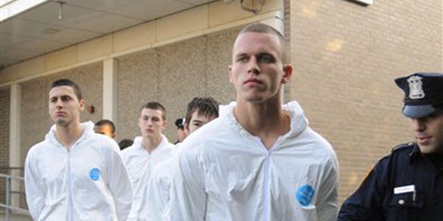 Nov. 10, 2008: Jeffrey Conroy, foreground, and other teens accused in a fatal attack on a Hispanic immigrant, are led out of the Fifth Precinct in Patchogue, N.Y. A Long Island jury on April 19 convicted 19-year-old Conroy of manslaughter.
