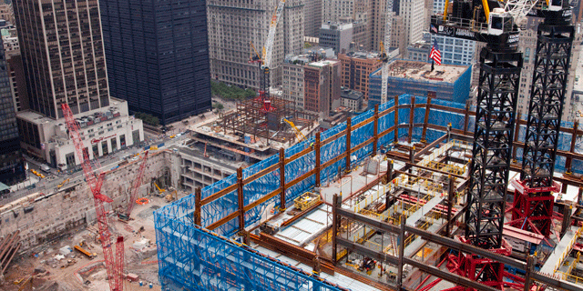 Construction cranes tower above One World Trade Center, Friday, August 13, 2010 in New York. (AP)