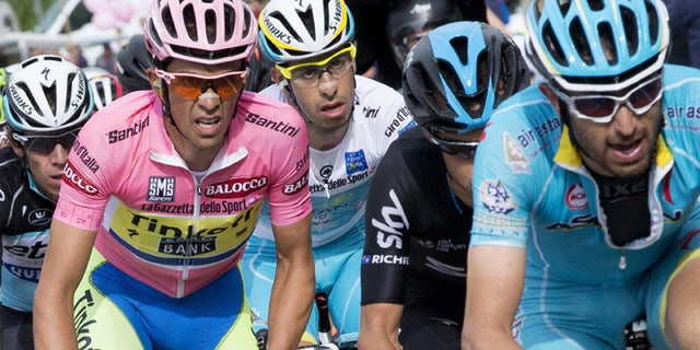 Overall leader Alberto Contador, of Spain, wears the pink jersey during the eight leg of the Giro d'Italia, Tour of Italy cycling race from Fiuggi to Campitello Matese, Italy, Saturday, May 16, 2015. (Claudio Peri/ANSA via AP) ITALY OUT