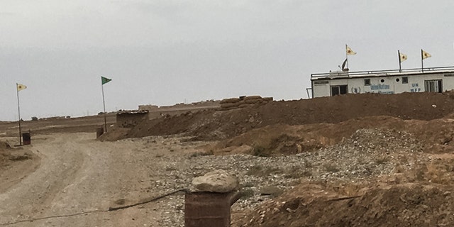 A dusty road on the Iraq-Syria border.