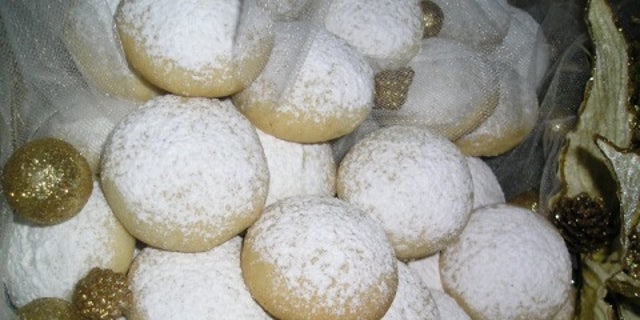 A Bulgarian baker was arrested after serving cocaine-sprinkled cookies to guests at a Greek funeral, news website Novinite reported Wednesday.