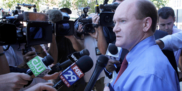 Delaware Democratic Senate candidate Chris Coons talks with reporters after a visit to Libby's Restaurant, Wednesday, Sept. 15, 2010, in Wilmington, Del. (AP)