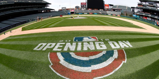 Coors Field in Denver (really) is seen as grounds crew members prepare the ballpark for the Colorado Rockies' home opener, April 5, 2018.