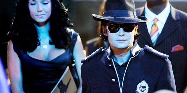 Actor Corey Feldman arrives at the memorial service for Michael Jackson at the Staples Center in Los Angeles July 7, 2009. Michael Jackson's family and close friends held a private service at a Los Angeles cemetery on Tuesday as fans crowded into the city's downtown area for a star-packed public memorial to the "King of Pop." REUTERS/Wally Skalij/Pool (UNITED STATES) - RTR25F4M