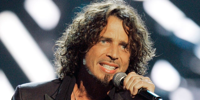 In this Sept. 5, 2008, file photo, musician Chris Cornell performs on stage during Conde Nast's Fashion Rocks show in New York.
