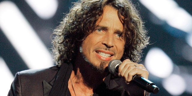 In this Sept. 5, 2008, file photo, musician Chris Cornell performs on stage during Conde Nast's Fashion Rocks show in New York.