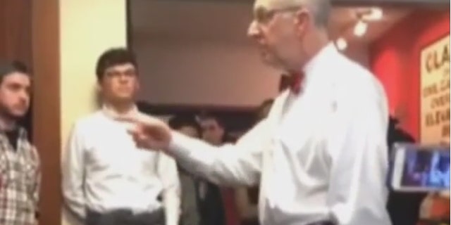 Cornell president David Skorton had a "testy" exchange with students who stormed his office in protest of health care opt-out fees by the school.