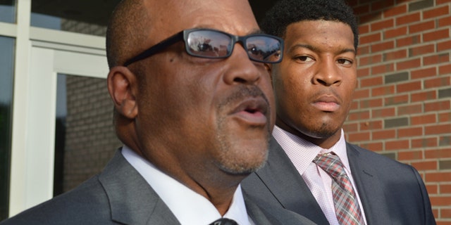 David Cornwell talks to reporters in Florida with his client Jameis WInston.