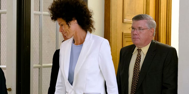 Cosby's accuser Andrea Constant leaves the courtroom at the Montgomery County Courthouse after a mistrial the Bill Cosby sexual assault case in Norristown, Pa., Saturday, June 17, 2017. Cosby's trial ended without a verdict after jurors failed to reach a unanimous decision. (Ed Hille/The Philadelphia Inquirer via AP, Pool)