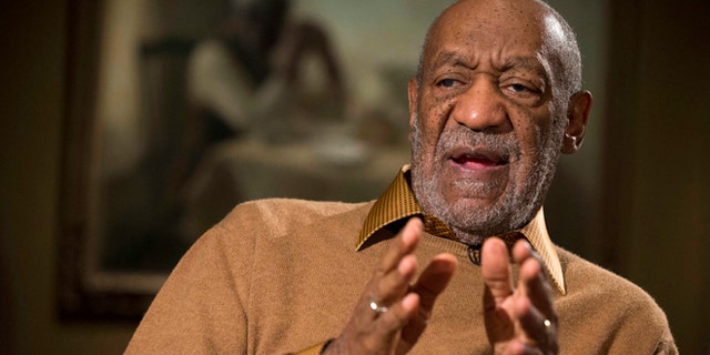 Nov. 6, 2014. Bill Cosby gestures during an interview at the Smithsonian's National Museum of African Art in Washington.