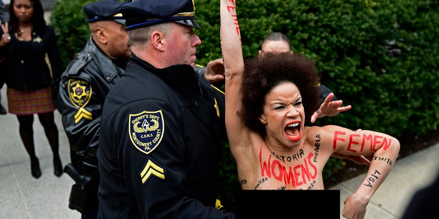 Nicolle Rochelle is part of the international women's group called Femen. She said her protest was a way to "symbolically taking back the ownership of all the victims’ bodies and redefining it as a political tool as opposed to a sexual object."