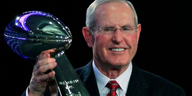Feb. 6, 2012: New York Giants head coach Tom Coughlin hold up the Vince Lombardi Trophy during a news conference after NFL Super Bowl XLVI in Indianapolis.