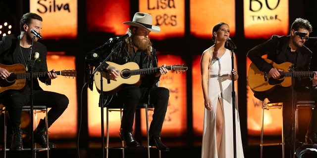 The Brothers Osborne, from left, Maren Morris and Eric Church perform at the 60th annual Grammy Awards at Madison Square Garden on Sunday, Jan. 28, 2018, in New York.