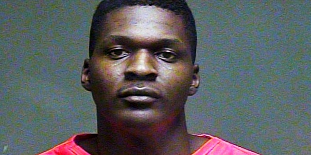Feb. 9, 2016: This booking photo shows Quinton Dashawn Laster. The 20-year-old was arrested after police found the decapitated bodies of his grandmother, Sharon Reed, 59, and her husband, James Earl Reed, 78, in their Oklahoma City home. (Oklahoma County Sheriff's Office via AP)
