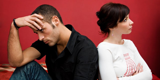 relationship difficulties: young couple having a fight