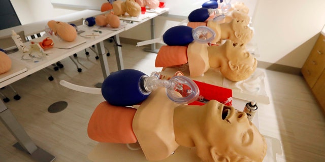 Male mannequins are arranged to train incoming medical students in CPR, in Jackson, Miss., Aug. 4, 2017.