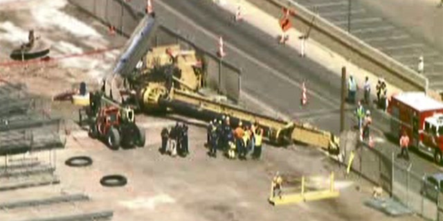 The crane was being utilized for construction of the airport's PHX Sky Train.