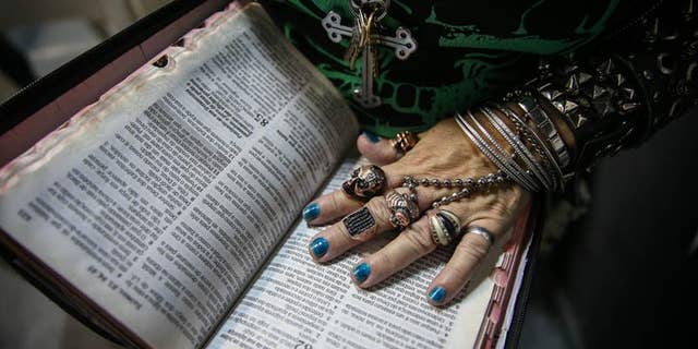 Woman attending worship at the Crash Church in Sao Paulo, Brazil, on Jan. 8, 2017.