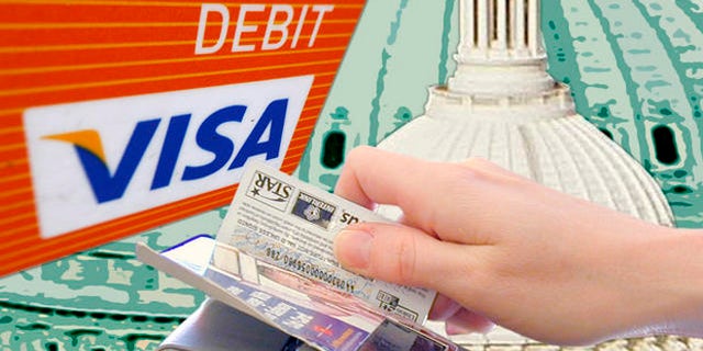 This photo taken Monday, Aug. 16, 2010, shows the Visa logo on the front of a Debit Card in Philadelphia. (AP Photo/Matt Rourke)