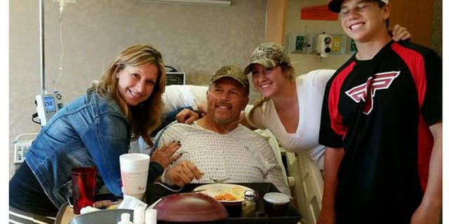 Photo shows John Sain with his wife and children after his four-day ordeal in Idaho back country with broken leg. (Jennifer Sain)