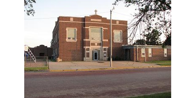 UNDATED: Americans United for Separation of Church and State says the cross on Spearville Elementary School in Spearville, Kansas, violates the First Amendment.