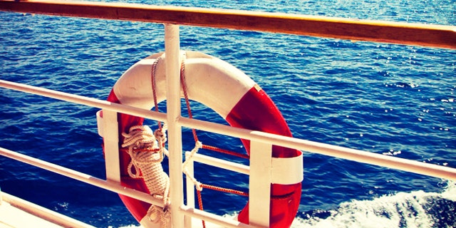 Seascape and islands panoramic view from cruising ship deck. Instagram retro effect added.