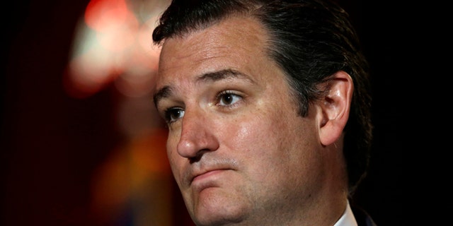 U.S. Sen. Ted Cruz, R-Texas, pauses as he delivers a speech to 2014 Red State Gathering attendees, Friday, Aug. 8, 2014, in Fort Worth, Texas. Possible presidential candidate Cruz predicts Republicans will retake the Senate this year and that "2016 will be even better." (AP Photo/Tony Gutierrez)