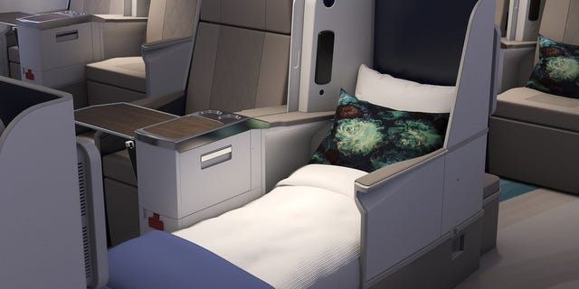 The plane's interior includes 84 lie-flat seats