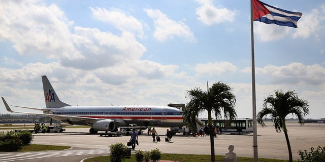 HAVANA, CUBA - JANUARY 19: Passengers walk across the tarmac at Jose Marti International Airport after arriving on a charter plane operated by American Airlines January 19, 2015 in Havana, Cuba. Officials from the Cuban and United States governments will hold meetings this week in Havana to being establishing migration agreements and noramalized relations. (Photo by Chip Somodevilla/Getty Images)