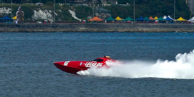 The Lucas Oil SilverHook powerboat arrives at speed in Havana, Cuba, Thursday, Aug. 17, 2017. The team is claiming a record for a powerboat crossing from Florida to Cuba. (AP Photo/Ramon Espinosa)