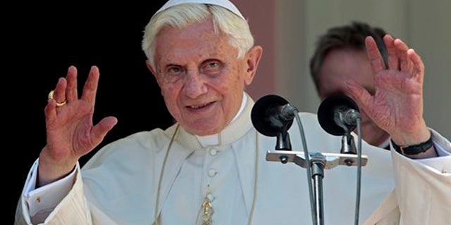March 27, 2012: Pope Benedict XVI waves after a prayer the Church the Virgin of Charity of Cobre, Cubas patron saint, in Santiago de Cuba, Cuba.