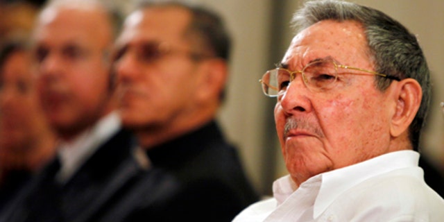 Cuba's President Raul Castro attends the opening ceremony of a new Catholic Seminary in Havana, Cuba, Wednesday Nov. 3, 2010. Castro joined Archbishop Thomas G. Wenski of Miami and other Roman Catholic leaders to open the national seminary, the first religious construction on the communist-run island in more than a half century. (AP Photo/Javier Galeano)
