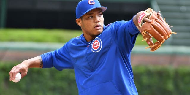 CHICAGO, IL - MAY 21: Chicago Cubs Shortstop Addison Russell (27) warms up before a MLB game between the Chicago Cubs and Milwaukee Brewers on May 21, 2017 at Wrigley Field in Chicago, IL. The Cubs defeated the Brewers 13-6. (Photo by Nick Wosika/Icon Sportswire via Getty Images)