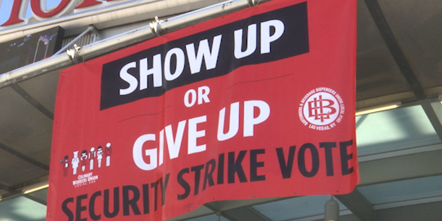 A culinary union banner calling for members to vote to strike hangs over the Thomas & Mack Center at UNLV on May 22nd.