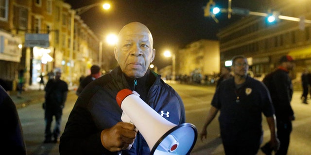 April 29, 2015: U.S. Rep. Elijah Cummings, D-Md., walks in Baltimore, amid protests over Freddie Gray's death.