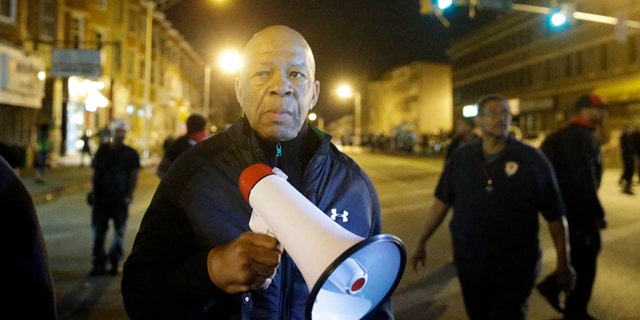 April 29, 2015: U.S. Rep. Elijah Cummings, D-Md., walks in Baltimore, amid protests over Freddie Gray's death.