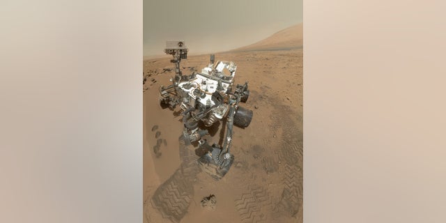 NASA's Mars rover Curiosity used its Mars Hand Lens Imager (MAHLI) to snap a set of 55 high-resolution images on Oct. 31, 2012. Researchers stitched the pictures together to create this full-color self-portrait.