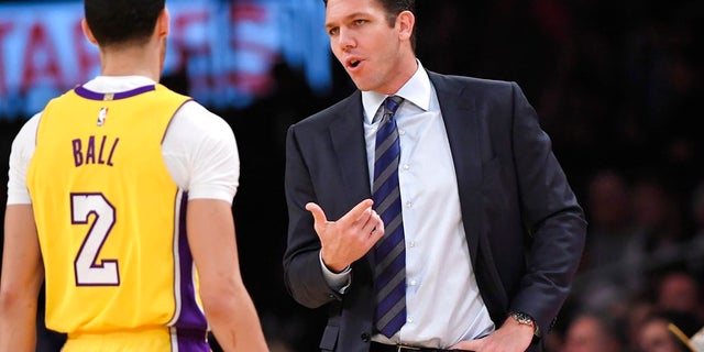 "I'll play for anybody," Lakers rookie Lonzo Ball, left, said when asked about his coach, Luke Walton.