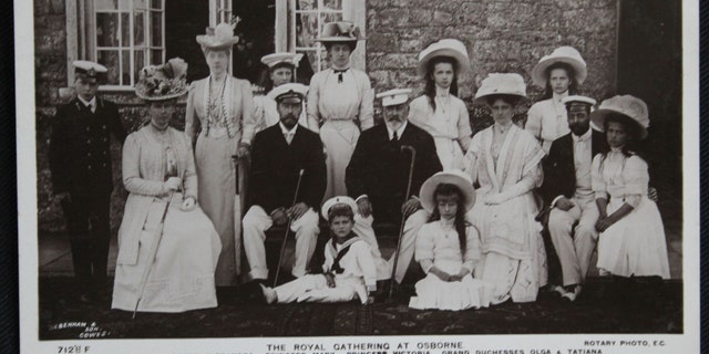 Postcard of Czar Nicholas II and his family on a visit to King Edward VII and the British royal family in 1909 (Henry Aldridge & Son).
