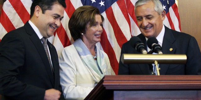 Rep. Nancy Pelosi with Guatemalan President Otto Molina, right, and Honduran President Juan Hernández.