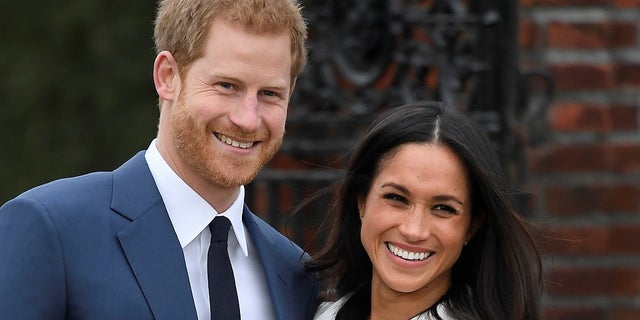 Britain's Prince Harry and his wife Meghan Markle. He is sixth in line to the throne.
