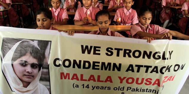 Oct. 17, 2012: Indian students participate in a prayer ceremony in support of and for the recovery of 14-year-old schoolgirl Malala Yousufzai, who was shot in the head last Tuesday by the Taliban for speaking out in support of education for women, at a school in Ahmadabad, India.