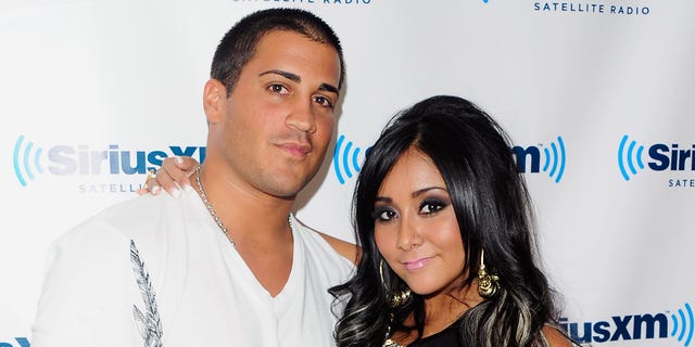 NEW YORK, NY - AUGUST 11:  Jionni LaValle and TV personality Nicole "Snooki" Polizzi visit SiriusXM's studio on August 11, 2011 in New York City.  (Photo by Andrew H. Walker/Getty Images)
